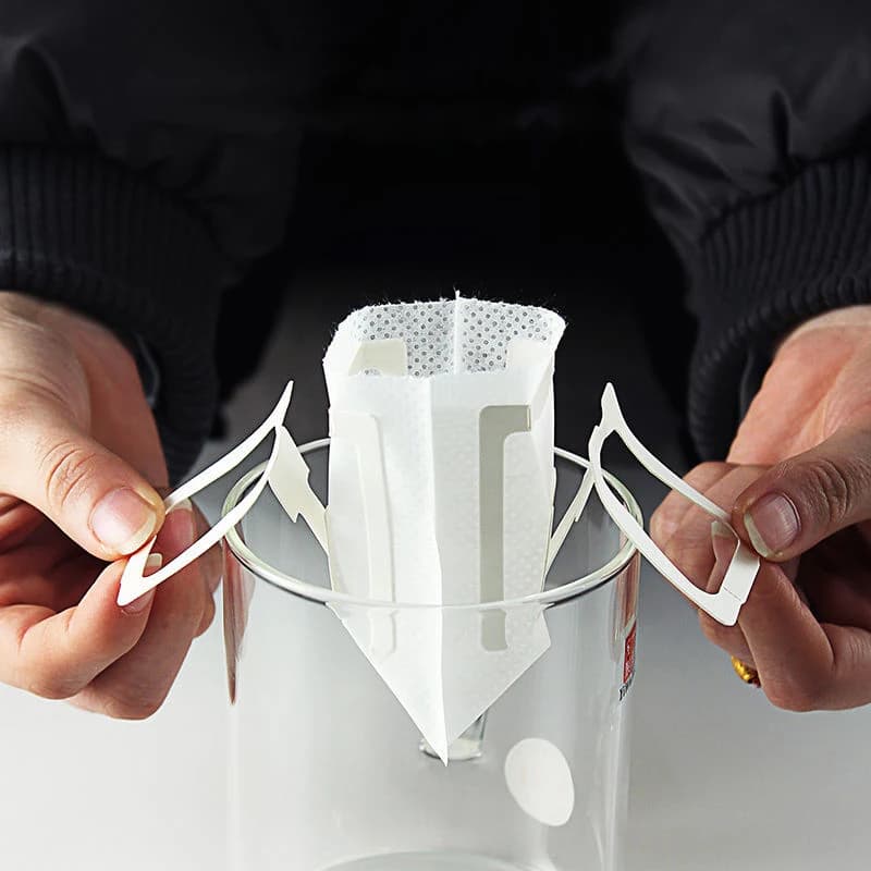 50/100 قطعة أكياس فلتر القهوة يمكن التخلص منها حزمة ورق قهوة بالتنقيط محمولة أذن معلقة ملحقات قهوة الإسبريسو أداة الشاي