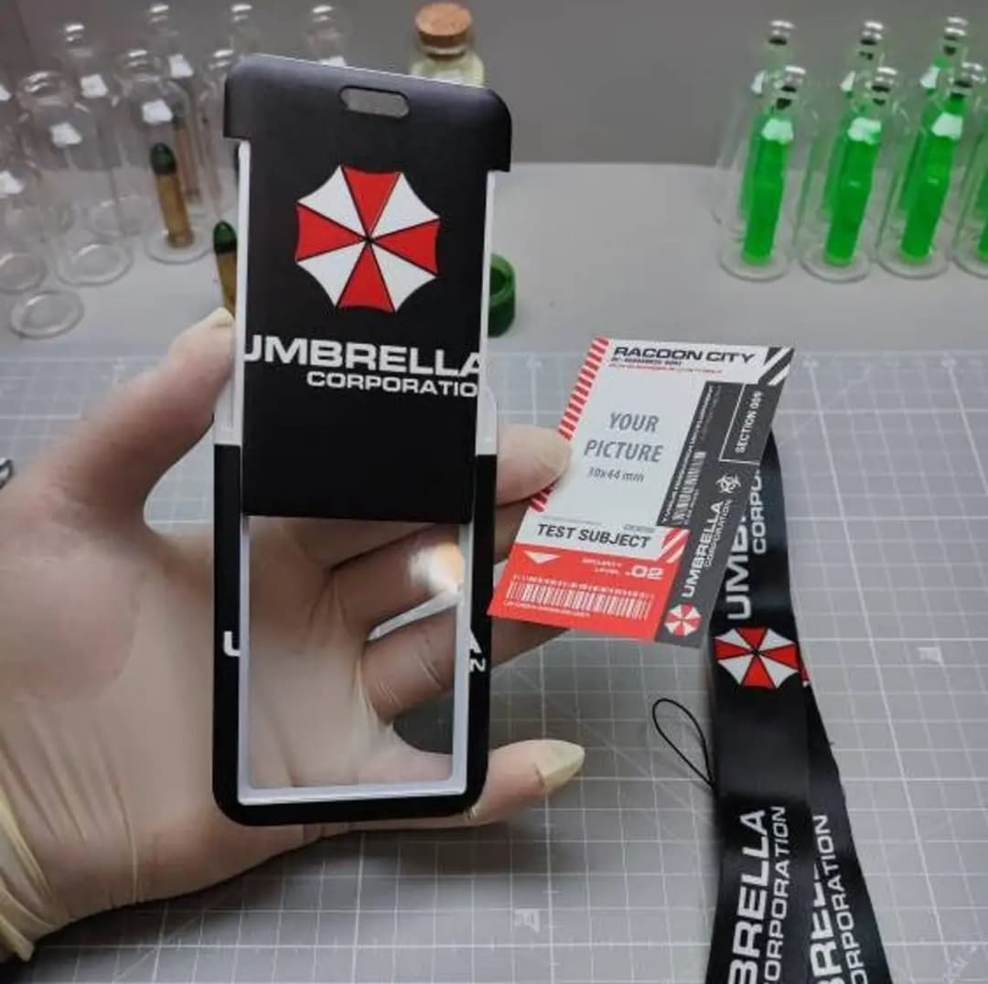 حامل بطاقات مزدوج الوجهين مع حبل تعليق من Umbrella Corporation، حامل بطاقات الهوية مع بطاقة معلومات الموظف - 2