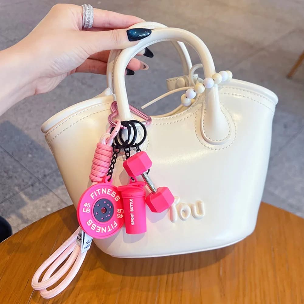 سلسلة مفاتيح رياضية على شكل دمبل قابلة للفصل، هدية مثالية لعشاق الرياضة