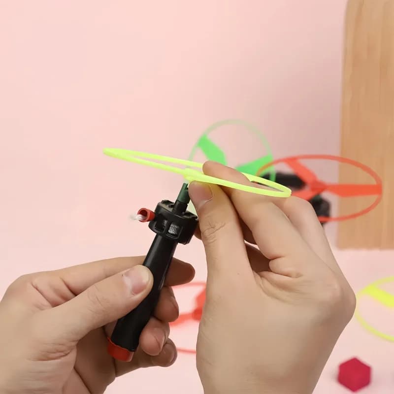 5 قطع أقراص طيران بلاستيكية ملونة بسحب الخيط، مروحة طائرة، ألعاب خارجية للأطفال، لعبة الغزل الطائر - 2