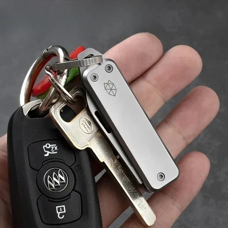 سكين منزلي صغير متعدد الوظائف من الفولاذ المقاوم للصدأ قابل للطي حاد للخارج مع سلسلة مفاتيح محمولة لتقطيع الفواكه وفتح الصناديق - 3