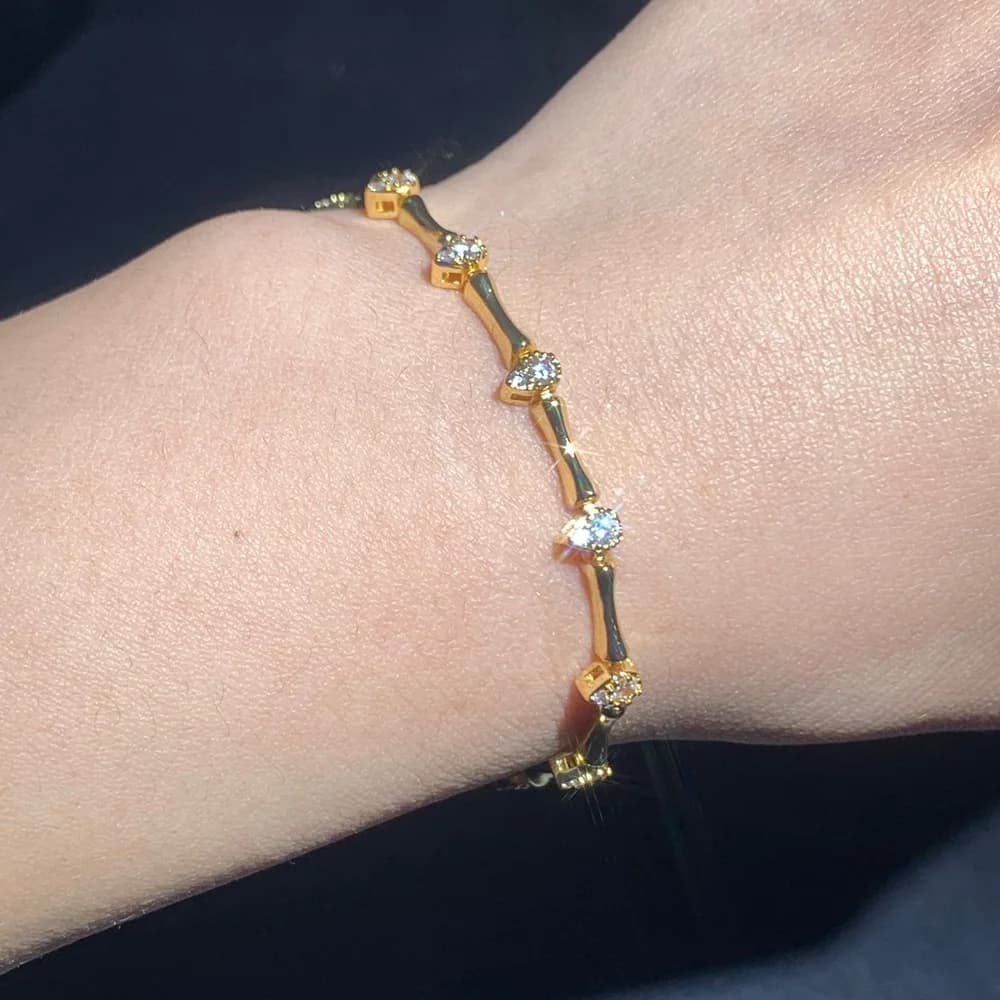 سوار نسائي على شكل سلسلة تنس مرصعة بالزركونيوم المكعب بلون ذهبي، تصميم على شكل عظمة خيزران - 6